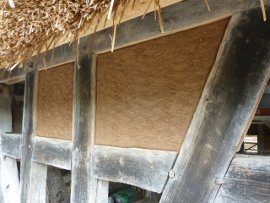 Gefach mit Staken und Flechtwerk mit Strohlehmbewurf